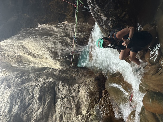 Exploring a canyon waterfall